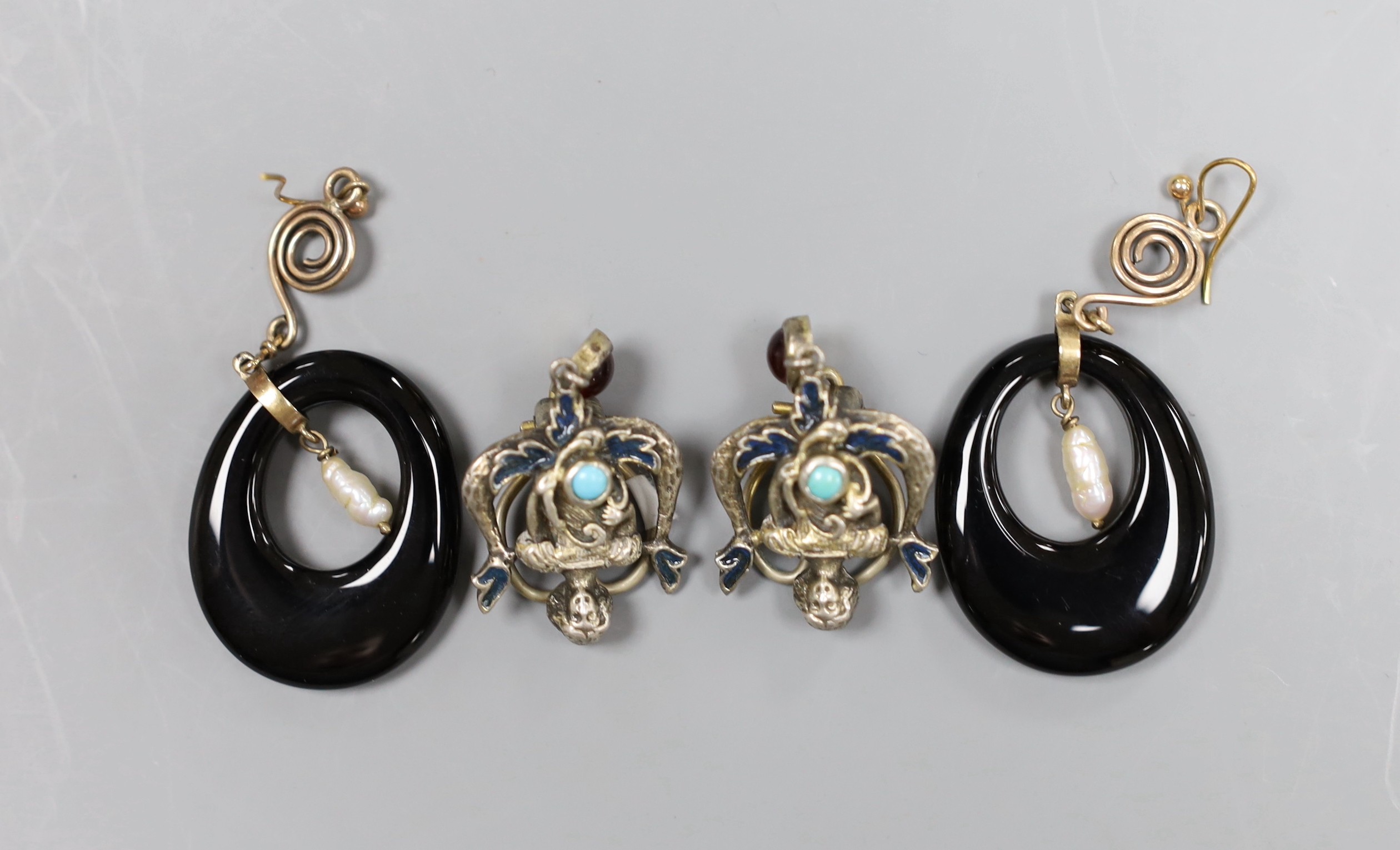 A pair of Austro-Hungarian style enamelled white metal ear-clips, 3.5cm and a pair of 9ct gold baroque pearl and simulated jet drop earrings, 5.5cm